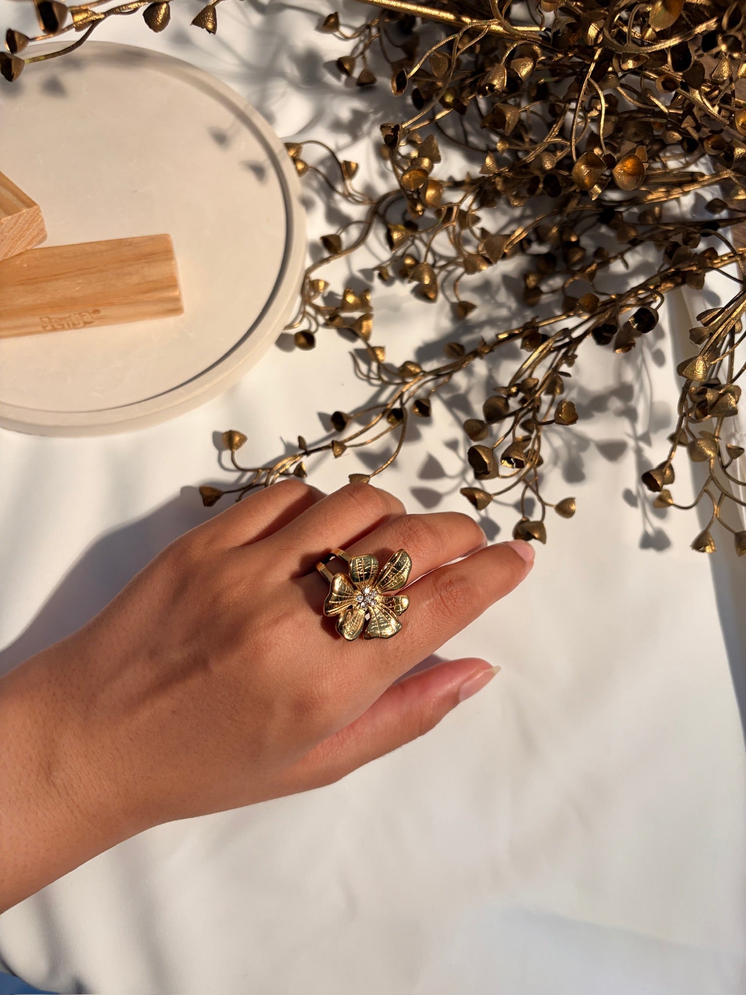 Premium stainless steel gold-plated rings in elegant lifestyle setting